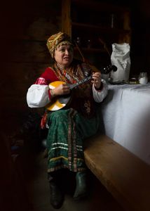 A vibrant Dombra player at the Fort Ross Annual Harvest Festival.