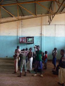 The same building is also accommodating orphans, they like to watch boxers during their practice.