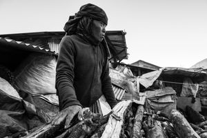 A resident of the village of Barpak doing everyday work.