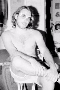Alessandro late at night with sunglasses found in the house.