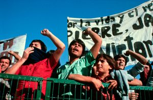 Young people protest against detention without trial and torture of fellow students. Santiago, Chile, 1987