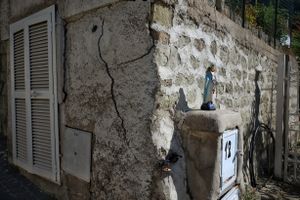 Madonna statue with rosaries