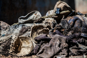 Remained skull of Islamic state fighter at the back of a truck on 25 April 2015.After the liberation of Kobane a committee was found to oversee the clean-up operation in war-ravaged town of Kobane.