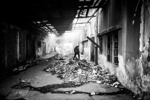 View of inside the abandoned barracks near the main train station in Belgrad. People live there in inhumane conditions.