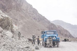 YOUNG MIGRANT ROAD WORKERS