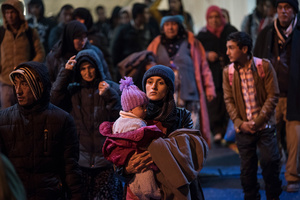 Refugees who arrive at the port of Piraeus after registering at Lesvos are on their way to board coaches and trains heading to Macedonia. Hundreds of refugees were arriving during 2015 every day to Athens after making a risky crossing from Turkey to Lesvos island. February 16, 2016, Pireaus, Greece.