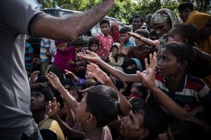 The Rohingya Refugee Crisis. People are desperate to get food and water from the aid agencies, camp near Ukhia, Bangladesh.