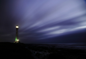 Slangkop lighthouse (III) / The Slangkop lighthouse is the tallest lighthouse on a steel tower in South Africa. It is located on the Cape Peninsula south of Cape Town, close to the small town of Kommetjie.This coast is always windy and frequently beaten by storms.