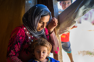 Bekaa Valley, LEBANON, September 5, 2014: Fadile (35) is mother of eight children; six girls and two boys. Most of the refugees living in Lebanon's makeshift shelters are women and children.