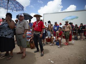 Gauchito Gil devotees lining up to access the temple of the popular saint during the January 8 celebrations, in Mercedes town