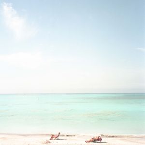 Couple sunbath, Vada, Livorno, Italy