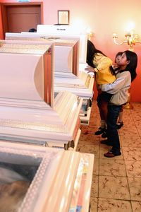 Funerals of the five children who drowned in the San Pedro River.