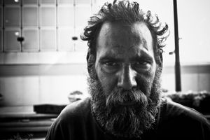 This is Joe. He had a strange, almost evil aura surrounding him. His stare was intense, piercing right through the lens. I failed to understand his word salad, soup and vegetables, mixed with some fruits... The only thing I retained was the fact that he hung out with John Lennon, and that he was still looking for him.       Houston TX.© Enilffo Raeppa