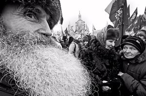 Maidan demontrators sees fundamentalist religious man and his two wives protest proposed tax on kiiosk and stall ved=ndors who hitherto had been untaxed appreciably. Before revolution, Maidan was center of rallies andprotests suchas this plus in summer rock concerts, etc,
