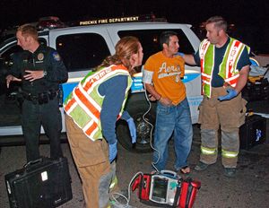 Phoenix Police and Fire Units working a Call for Service