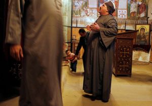 Prayer in one of the Coptic monasteries at Wadi Natrun                     The Coptic World © Bert Spiertz