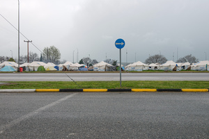 A refugee camp set up on the property of a gas station along the highway outside of the city of Polykastro in northern Greece. March 23, 2016.