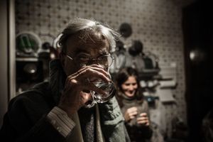 Prescribed medicensMere takes care that her elderly father takes his prescribed medicines. He has an often difficult temperament, as he was used to be a dominant character. © Riccardo Budini / UnFrame