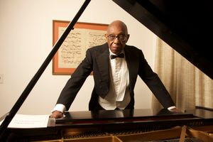 Composer, George Walker at his Steinway D in his music studio. Montclair, New Jersey