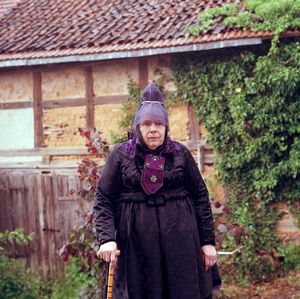 Martha Elisabeth Braun with the hood for Lord's Supper, Schwalm, Hesse, 2016. From the series: The last women in their traditional peasant garbs
