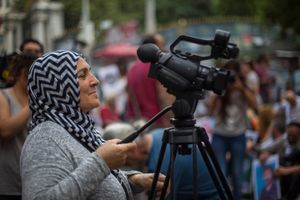 Hanim Tosun ,as a sentinel reporter for Ozgur Gundem Newspaper.