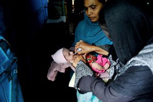 A child is vaccinated in Malegaon, Maharashtra