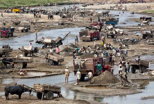 Dipayal Silgadhi, Nepal: Gold panning in the rivers in south-western Nepal provides survival to thousands. © Matjaz Krivic