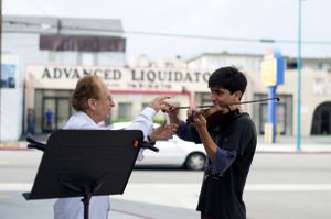 Darren and student at garage sale