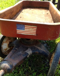 wagon with flag - yard sale