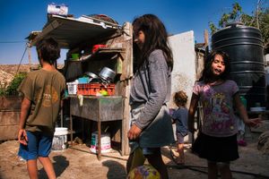 Children playing in the kitchen