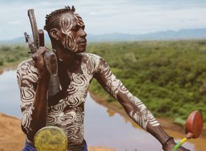 Oyta with his Kalashnikov, Kara Tribe, Ethiopia