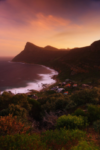 Remote village / This is Smitswinkel Bay, located on the Cape Peninsula, South Africa. The village looks so remote and secluded but is actually close to a tarred road. It can only be reached with a walk down the slope, it is a magical place.