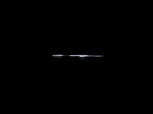 USA. Florida. 2015.  Illuminated surf board at night.