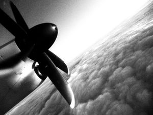 03: flying to a business destination wishing to go somewhere far away