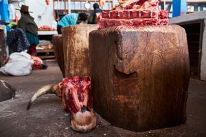 Cow head at a butcher shop at the Mercado de Calca, Calca, Peru