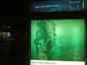 commercial advertisement on bus shelter kiosk, NYC, 2007,