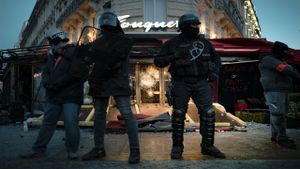 Yellow Vest riots in Paris. Champs-Élysées, 2019.