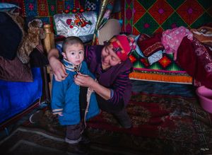 Kazakh children in traditional Mongolian clothes