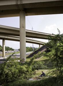 Juston Pope resting under an interstate on the site of the Nashville battlefield, 2010.