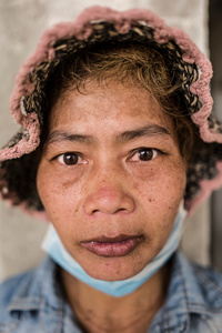 Portrait of Pich Sreyvy 32, from Svay Rieng Province after a days work.