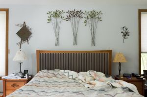 Ornamental Leaves, MA ("Several years ago, when we removed our old-fashioned, clunky bookcase headboard and updated to contemporary bedroom furniture, I spotted this metal tree branch sculpture in, of all places, an airline shopping magazine!") © Astrid Reischwitz