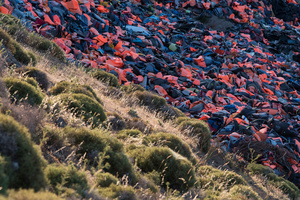 Thousands of life jackets used by refugees during their crossing from Turkey to the Greek shores pile at a dump in Lesvos. March 13, 2016, Lesvos, Greece