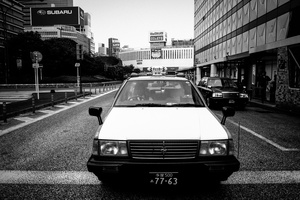 A cab wait on zebra crossing in the west part of Shinjuku station