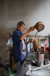A street coffee shop owner in Phnom Penh, Cambodia
