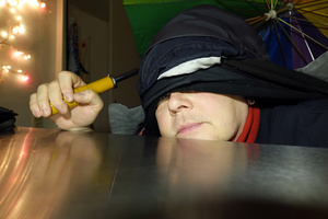 self portrait hooded, with climate change on stainless steel II