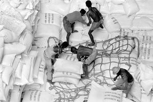 Unloading Donations of Rice" Tamatave, 1995