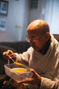 My father was not able to cook for himself anymore. So my brother, my sister and myself would bring him his food.