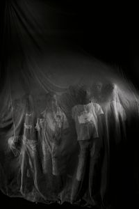 Behind The Mosquito Net