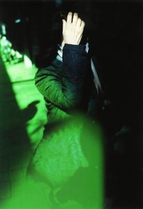 Woman in the street with green memory