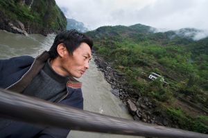 At one time the only way for most people of crossing fast and dangerous rivers, cable slides are still in use by the Lisu minority across the gorge of the Nujiang, the ‘Angry River’. © Michael Freeman
